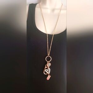 Elegant Gold Tone Heart And Eye Pendant Lanyard Necklace With Earrings.